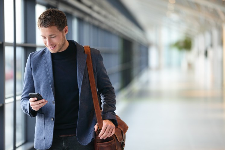 Man_smiling_on_phone